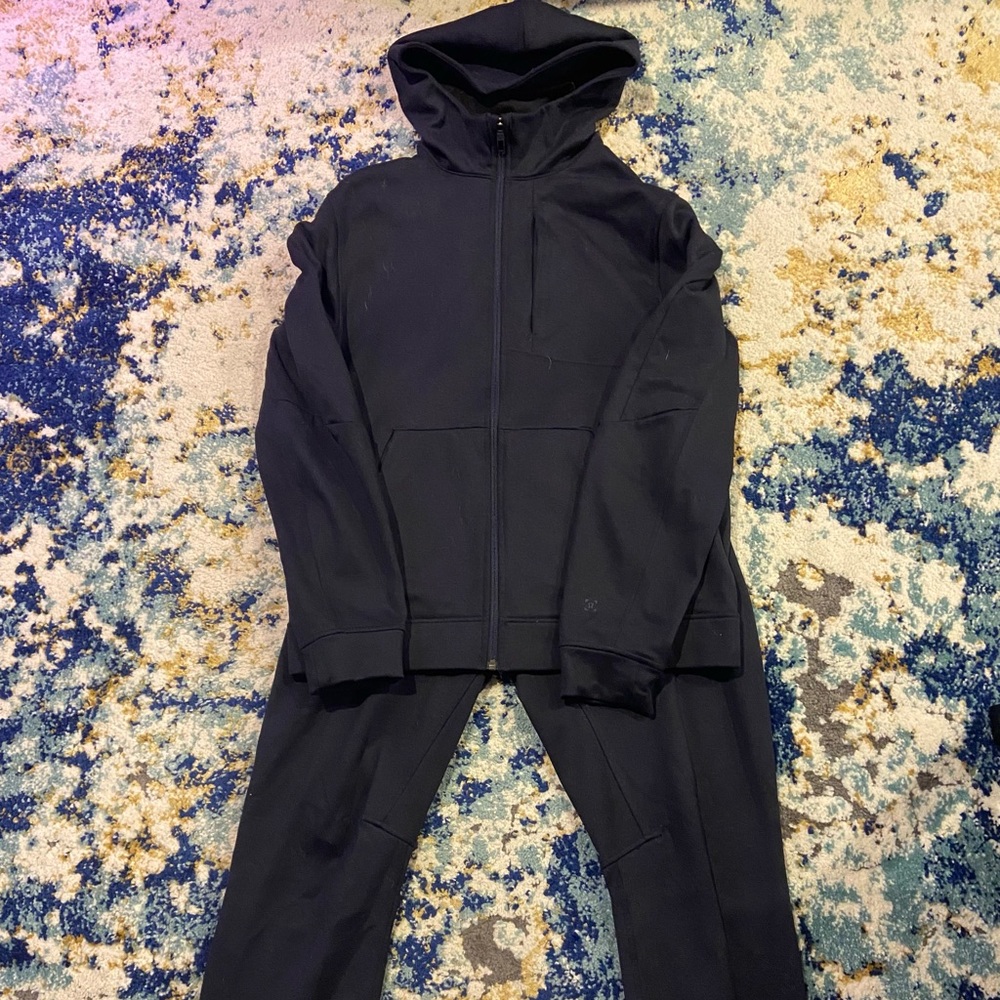 Lululemon zip up hoodie and jog pants.